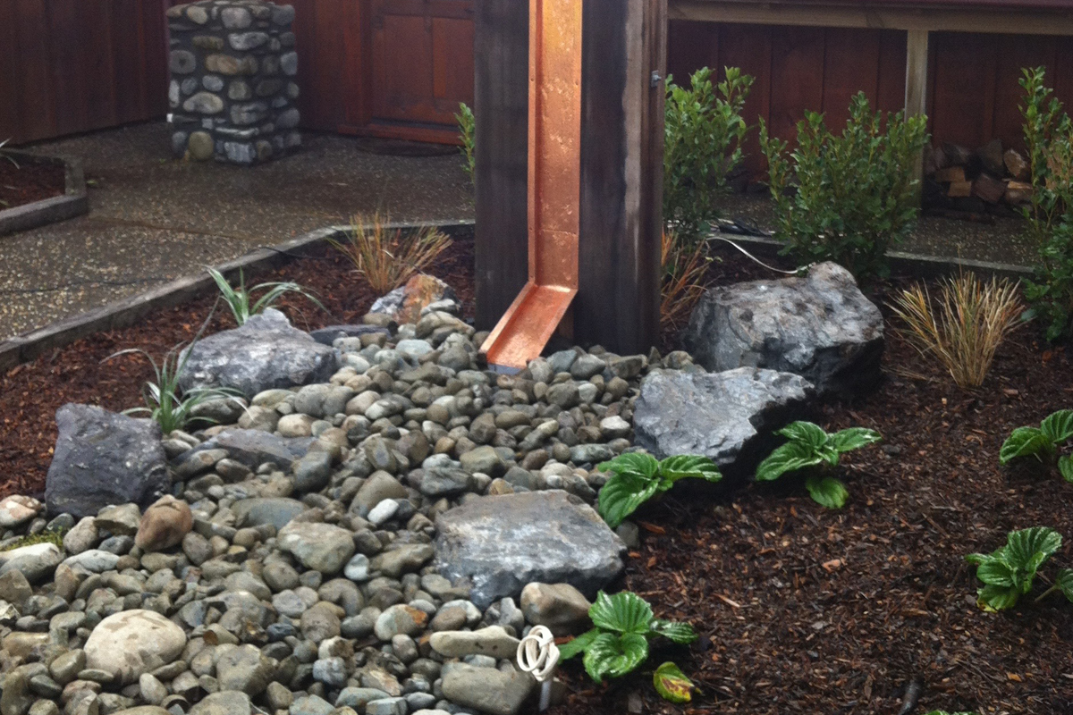 Total Landscape Solutions Construction Water feature and planting
